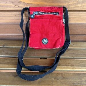 Kipling Red Messenger Bag with Black Strap